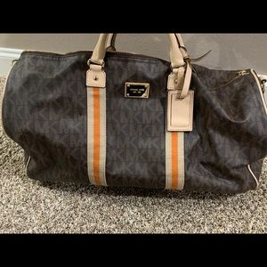 Michael Kors  carry on luggage